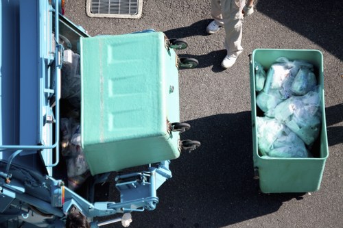 Workers sorting construction debris for recycling